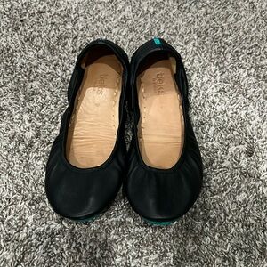 Black leather ballet flats by Tieks in a size 9